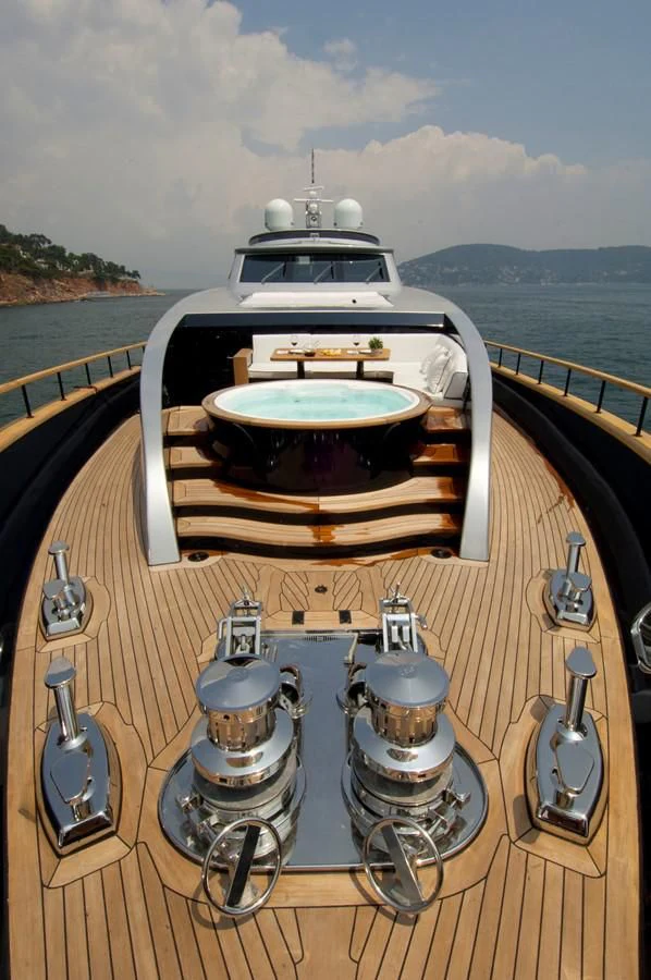 a boat on a deck aboard HARUN Yacht for Charter
