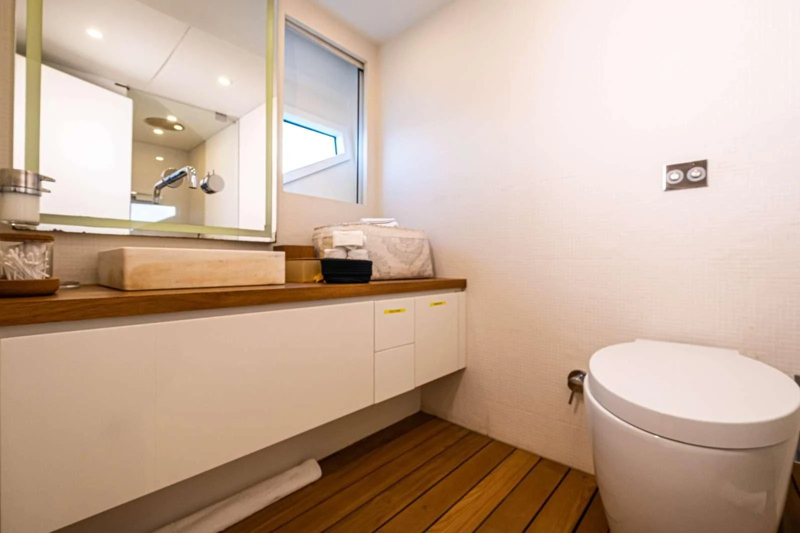 a bathroom with a toilet and a sink aboard HARUN Yacht for Charter