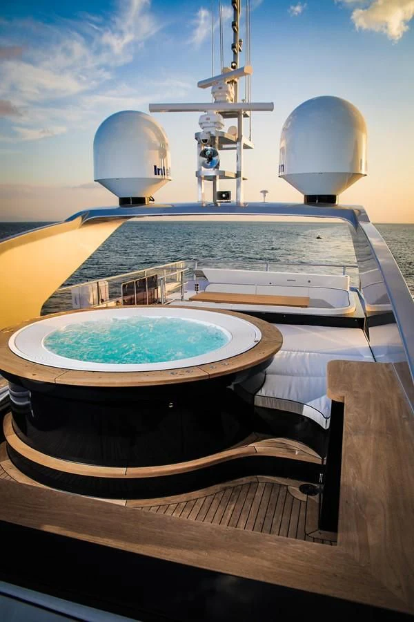 a large pool with a dome on top of it aboard HARUN Yacht for Charter