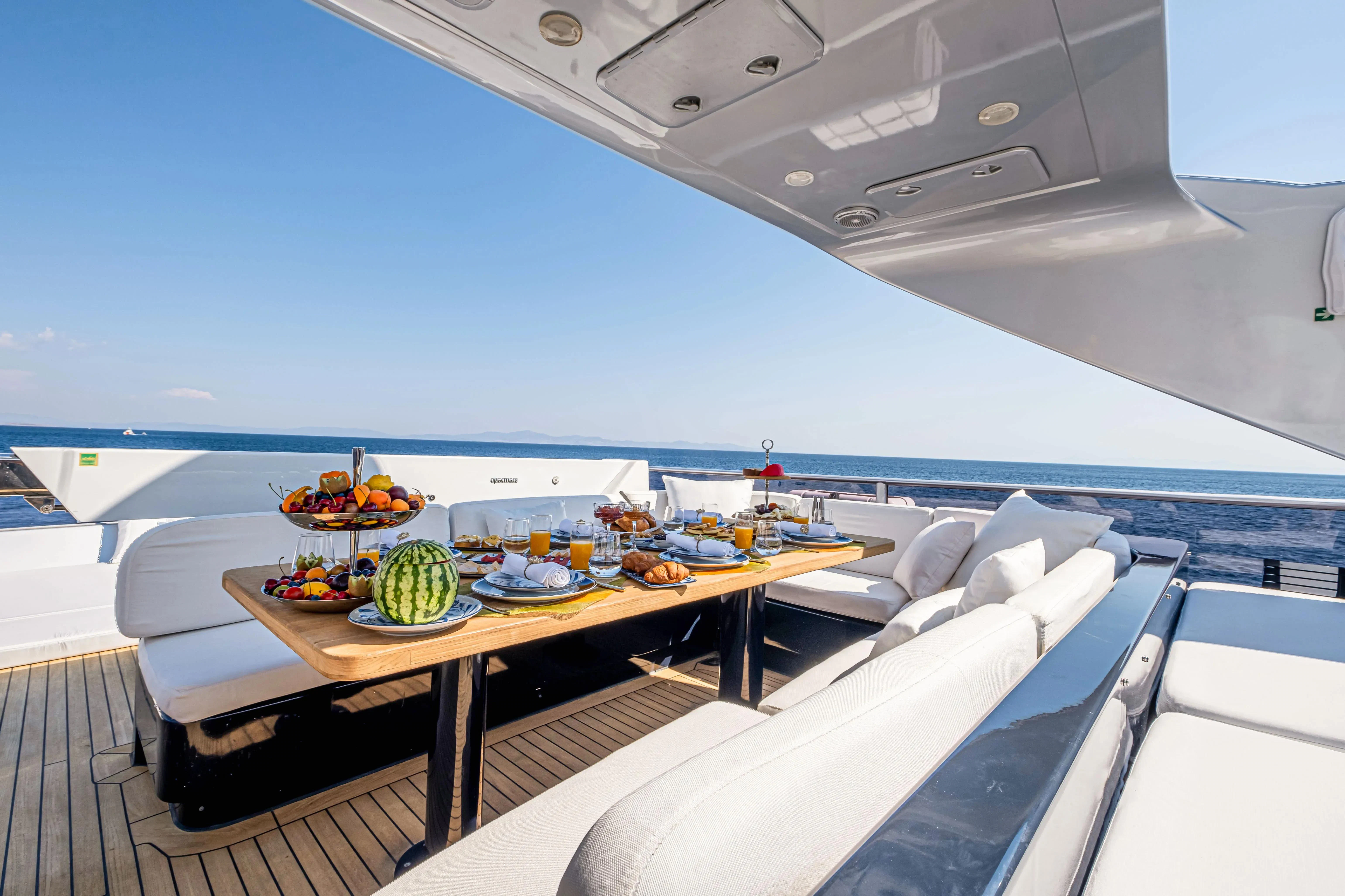 a table with food on it aboard HARUN Yacht for Charter