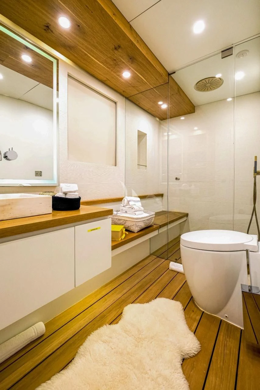 a bathroom with a toilet and a sink aboard HARUN Yacht for Charter