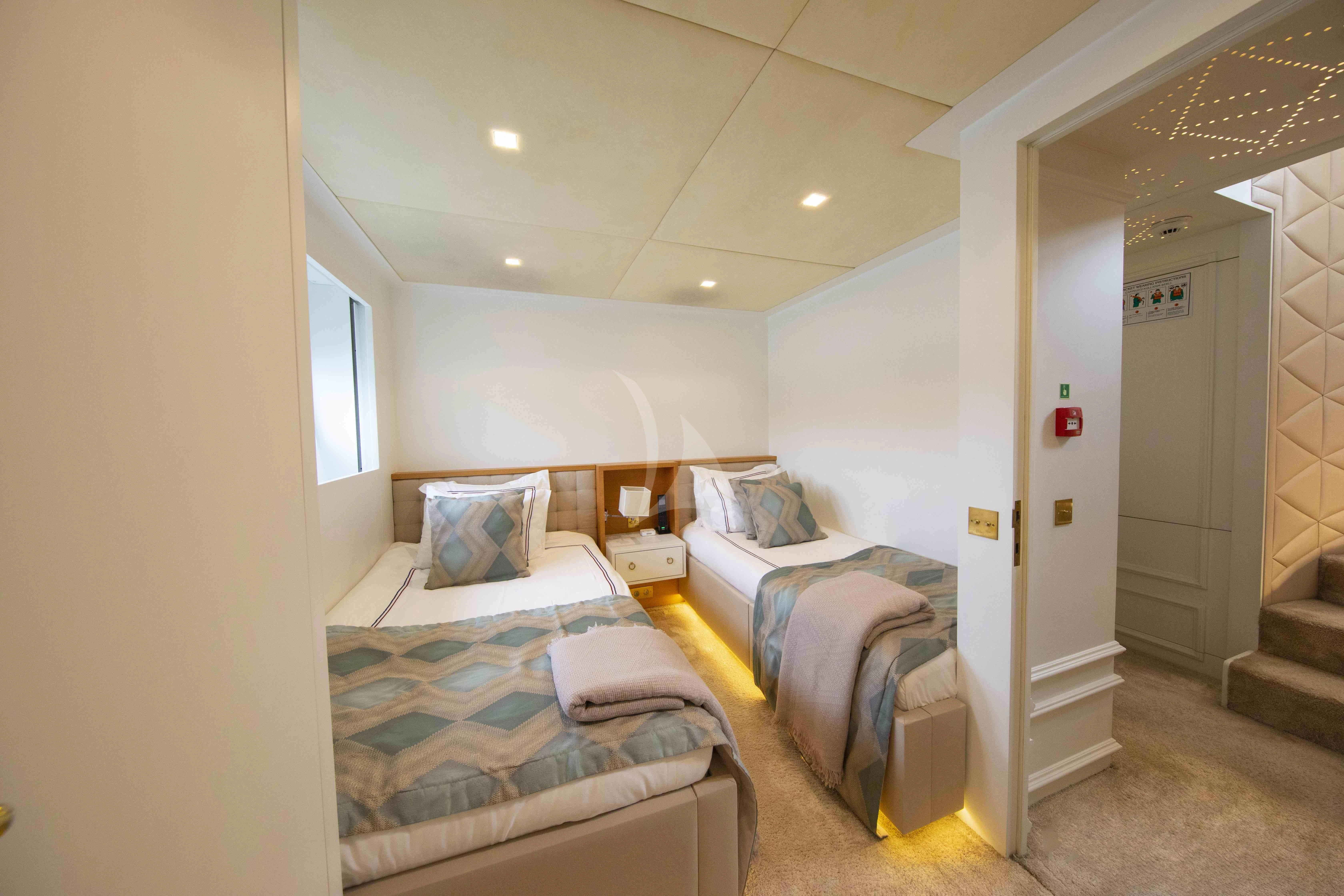 a couple of beds in a room aboard HARUN Yacht for Charter