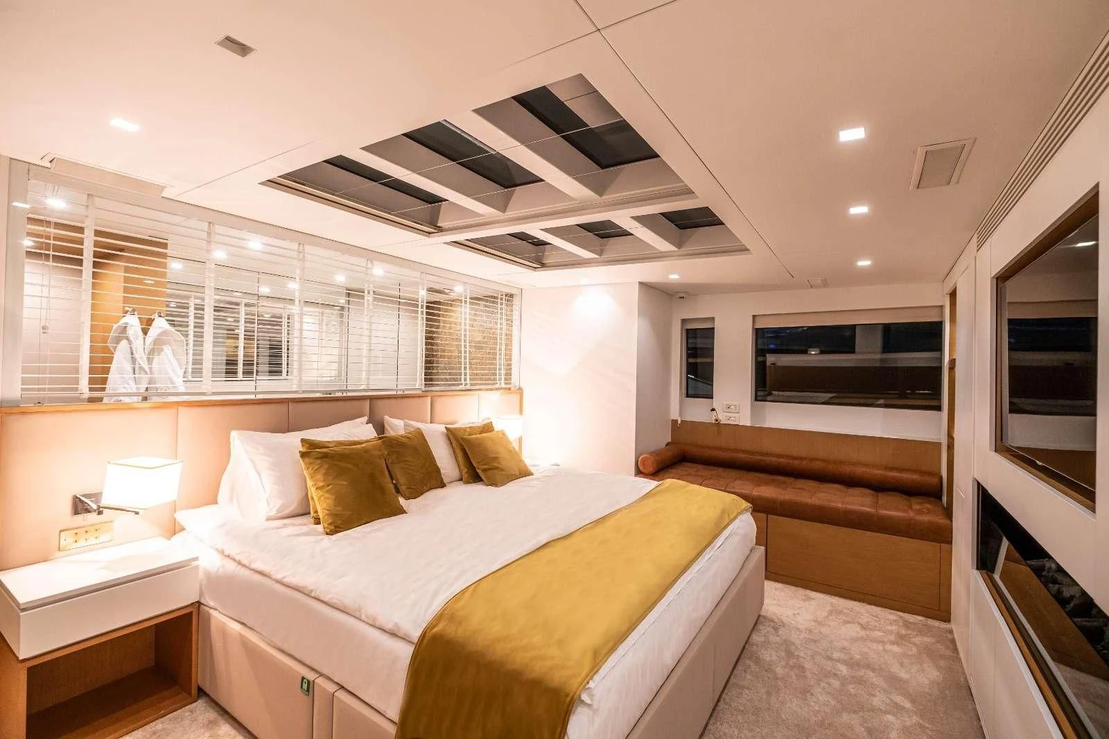 a bedroom with a large bed aboard HARUN Yacht for Charter