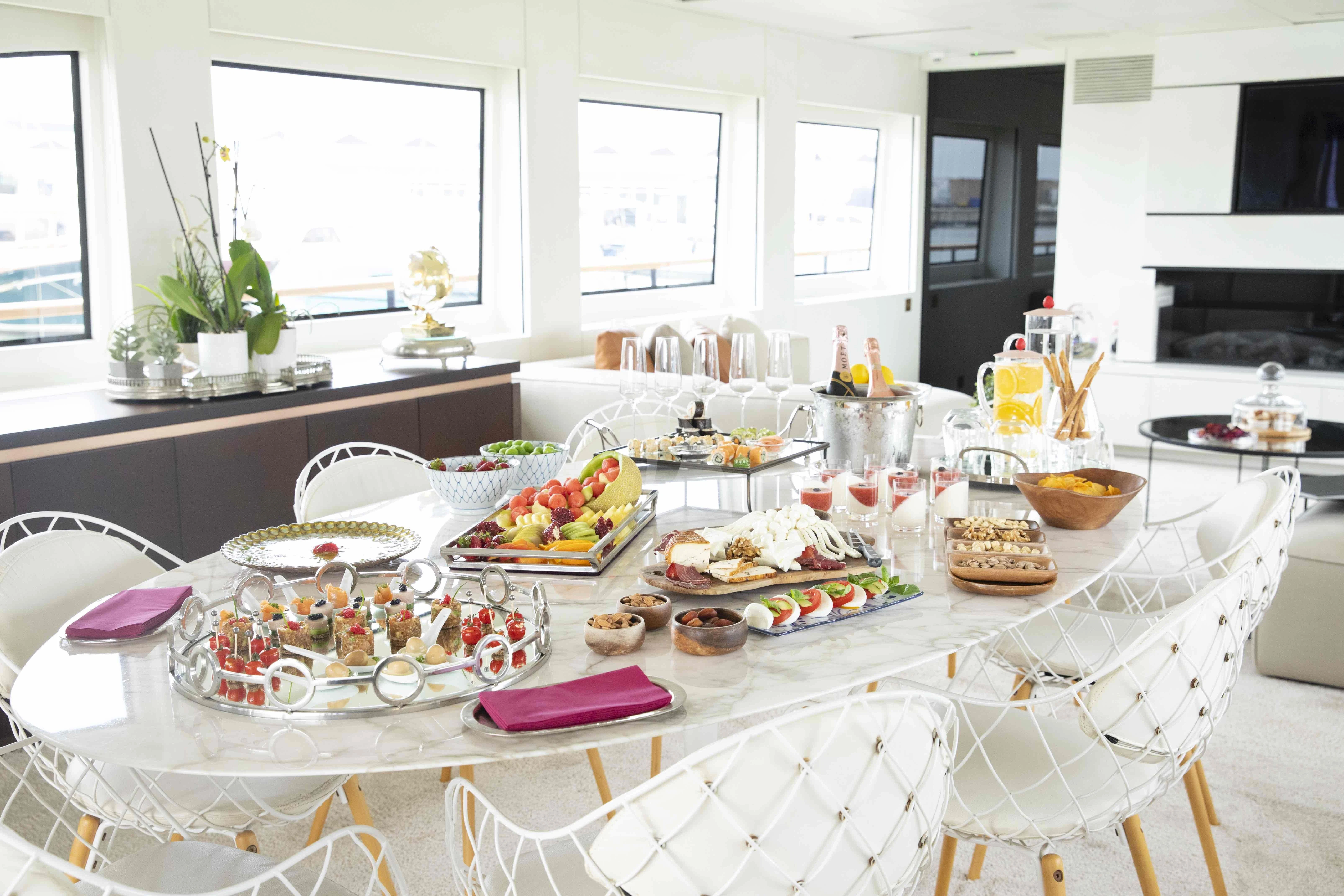 a table with food on it aboard HARUN Yacht for Charter