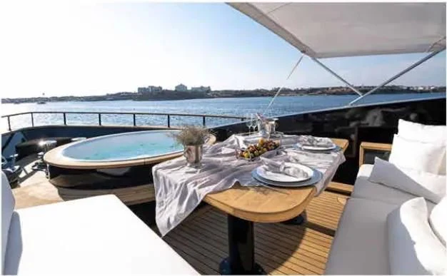 a table with food on it aboard HARUN Yacht for Charter