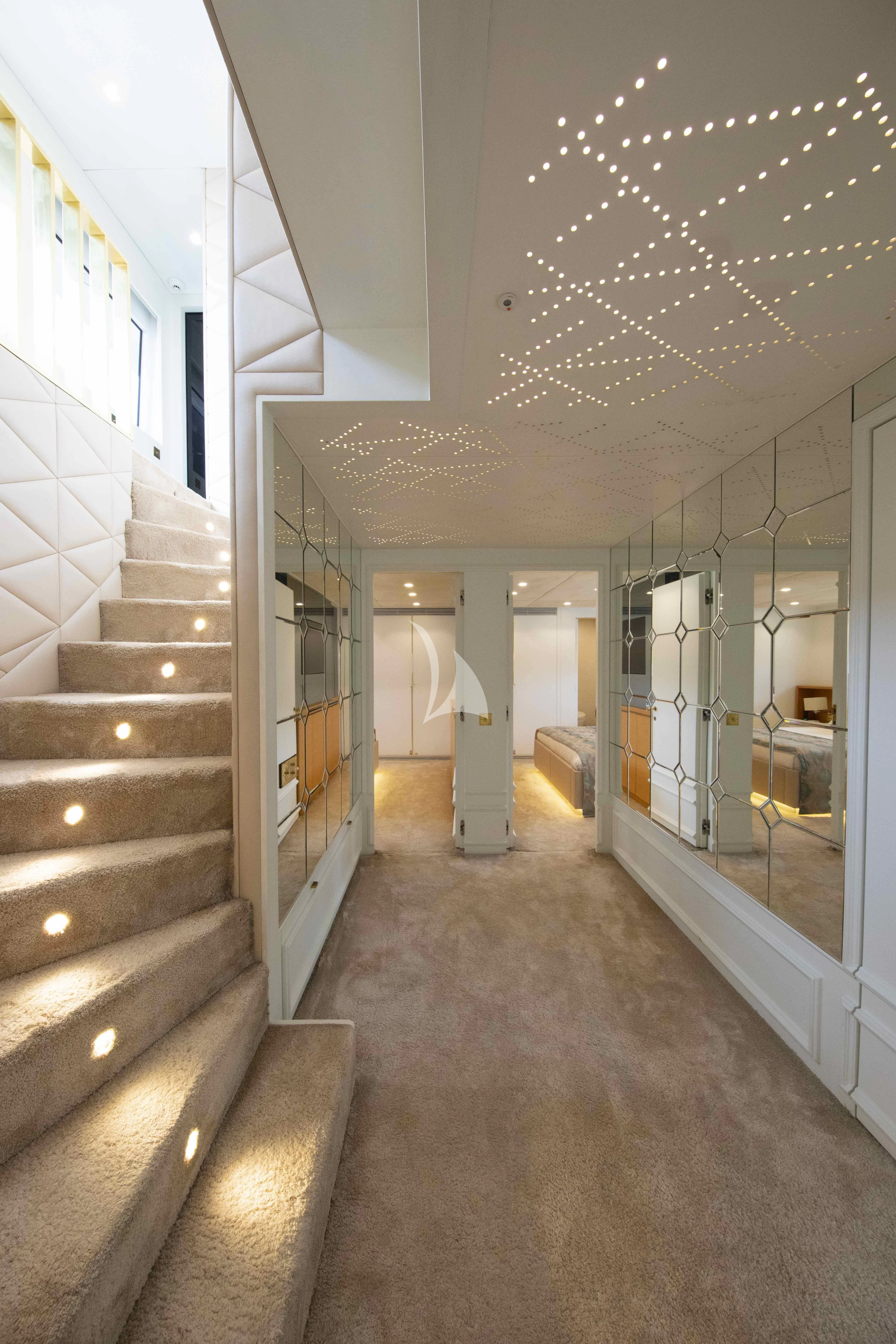 a staircase in a building aboard HARUN Yacht for Charter