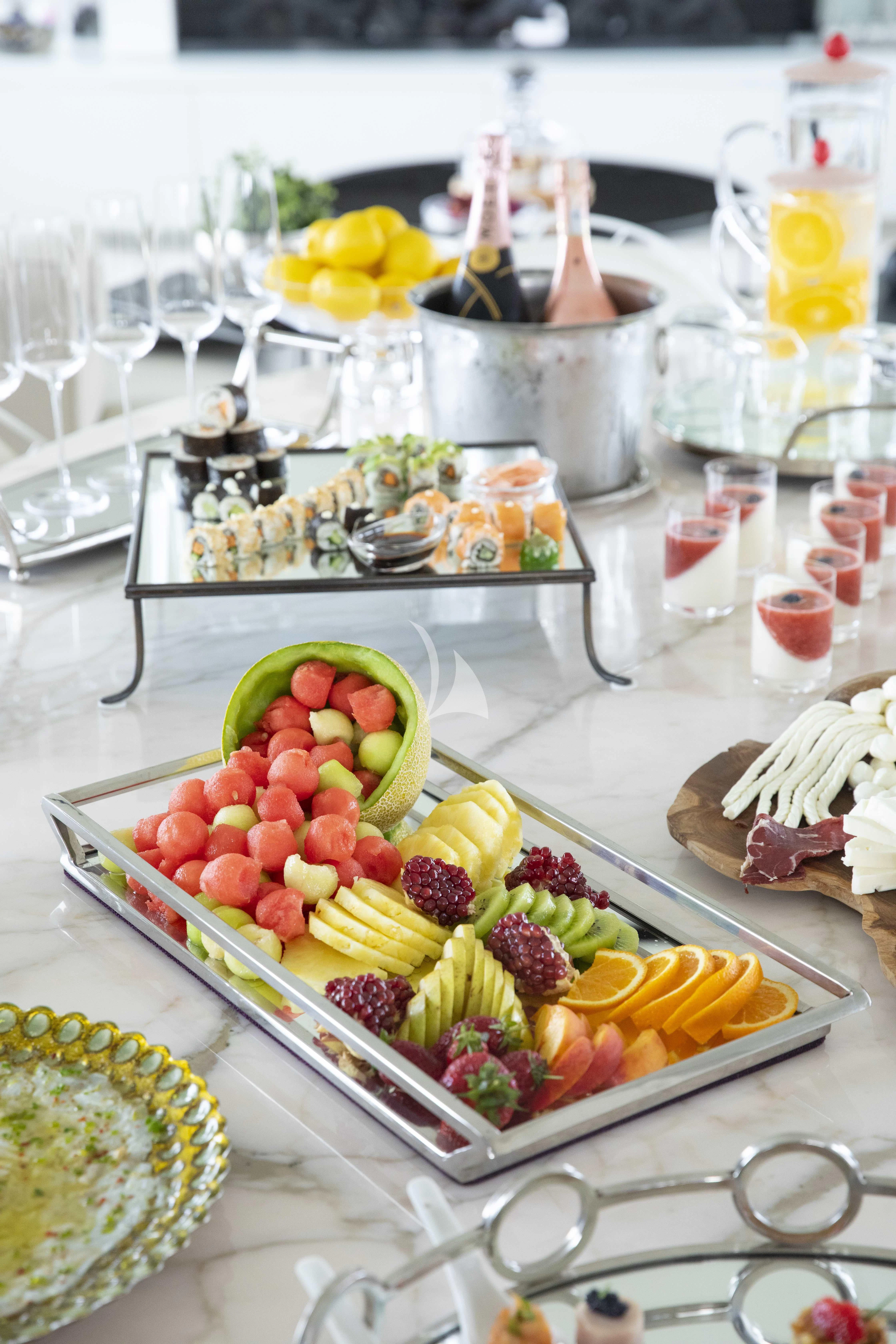 a table with food on it aboard HARUN Yacht for Charter