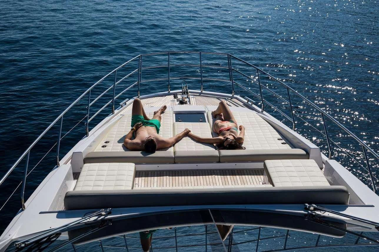 a couple of people on a boat aboard TAMARA II Yacht for Sale