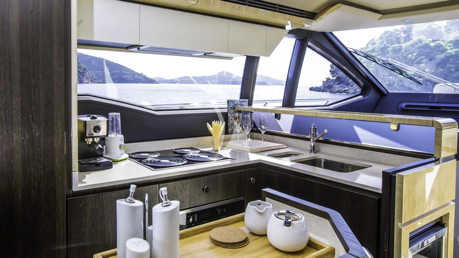 a kitchen with a sink and a window aboard TAMARA II Yacht for Sale