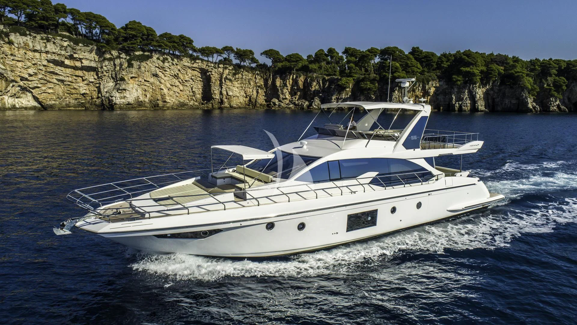 a white boat on water aboard TAMARA II Yacht for Sale
