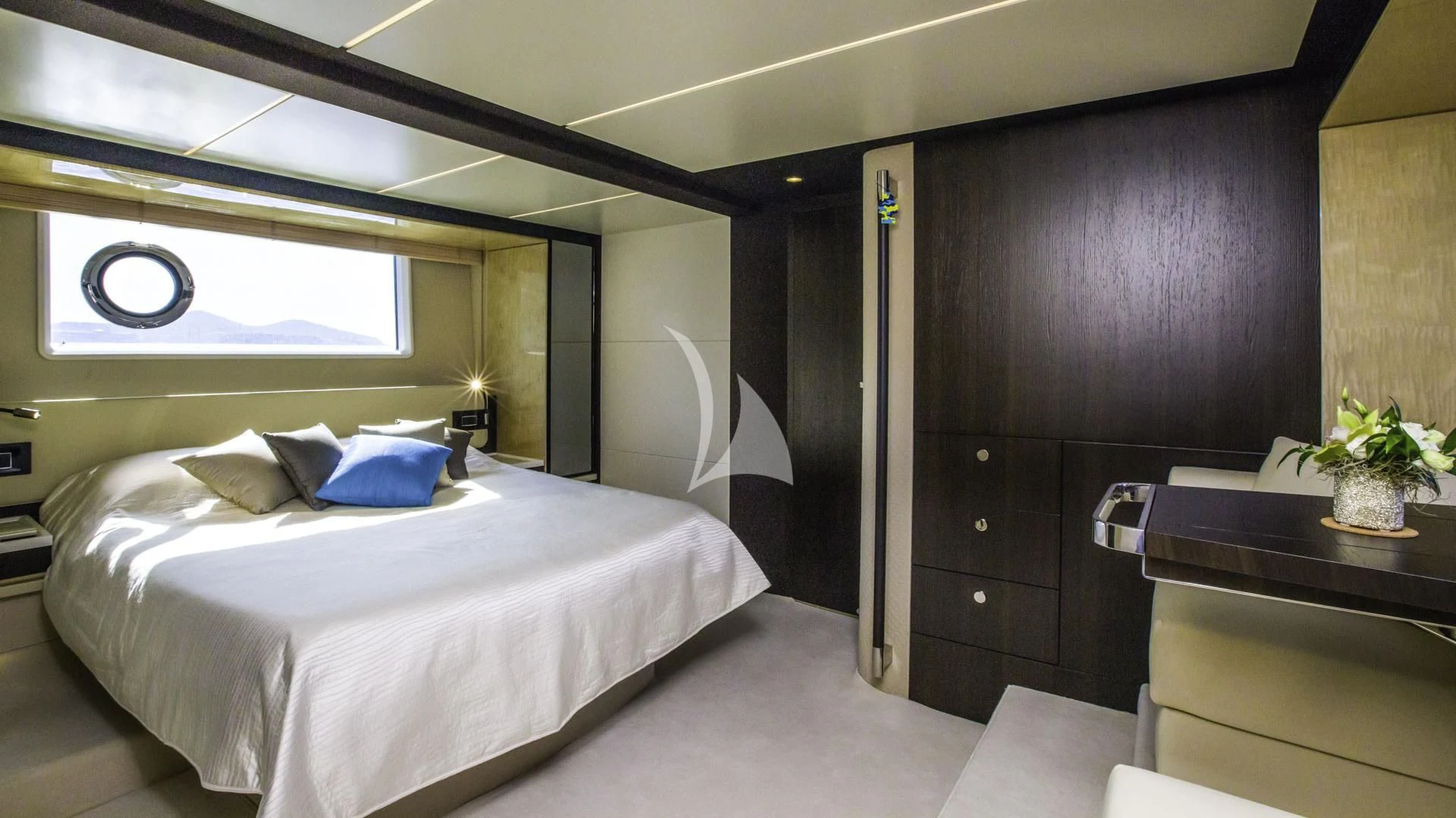 a room with a bed and a desk aboard TAMARA II Yacht for Sale