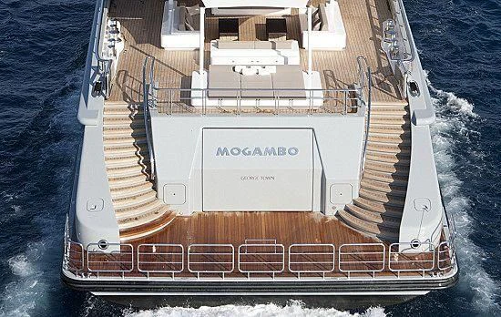 a large ship on the water aboard MOGAMBO Yacht for Sale
