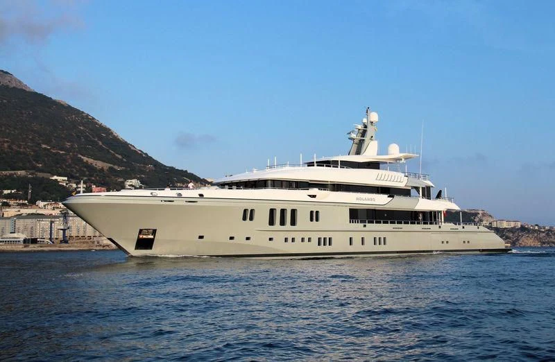 a large white boat in the water aboard MOGAMBO Yacht for Sale