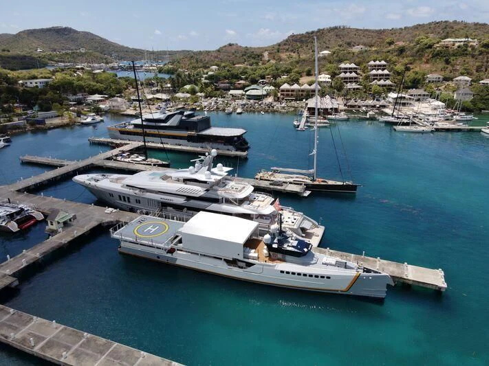a group of boats in a harbor aboard MOGAMBO Yacht for Sale