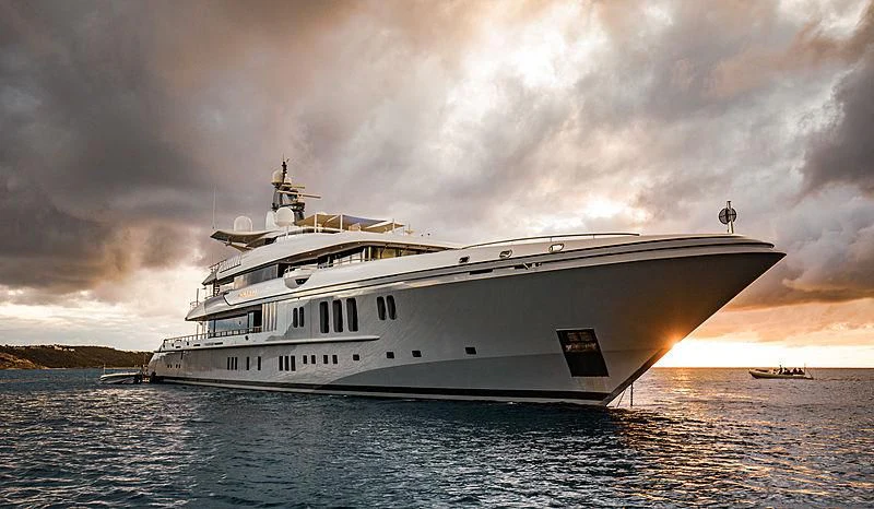a large white ship in the water aboard MOGAMBO Yacht for Sale