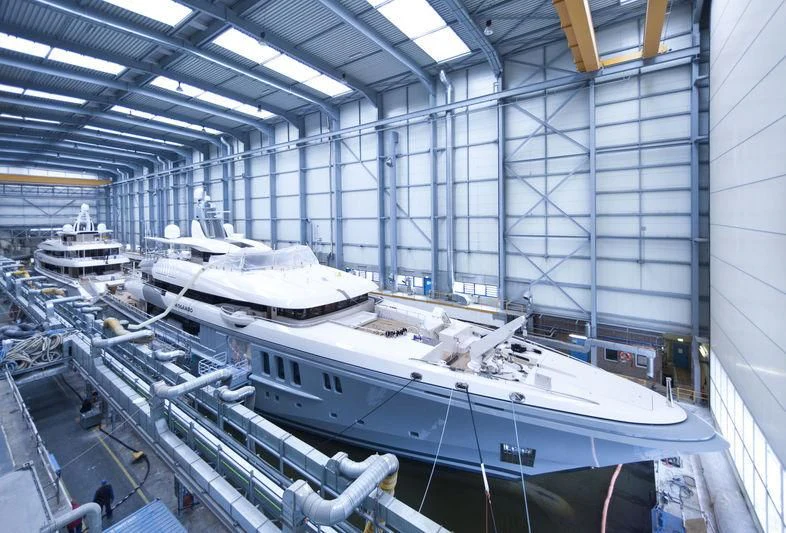 a large room with several white boats aboard MOGAMBO Yacht for Sale