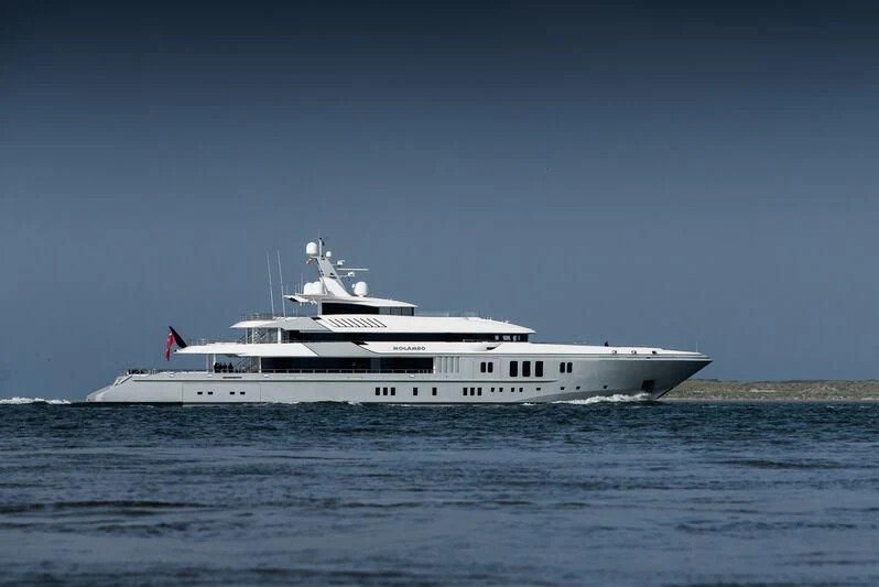 a white yacht in the water aboard MOGAMBO Yacht for Sale