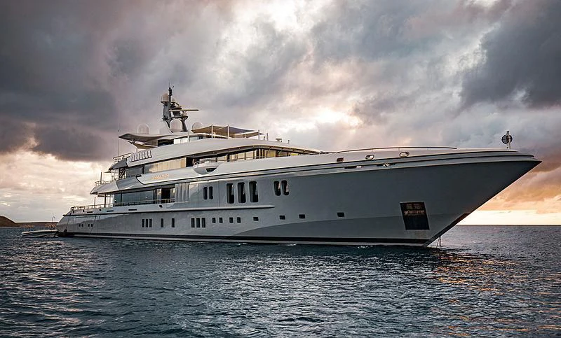 a large white ship in the water aboard MOGAMBO Yacht for Sale