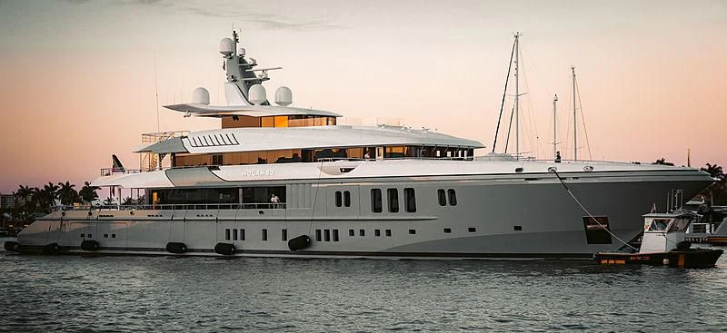 a large white boat in the water aboard MOGAMBO Yacht for Sale