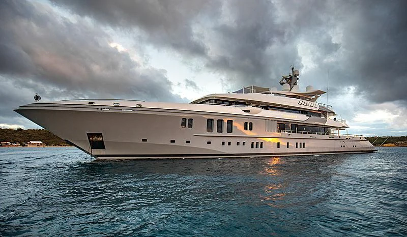 a large white ship on the water aboard MOGAMBO Yacht for Sale