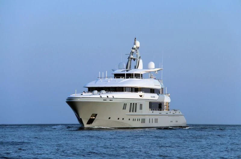 a large white boat in the water aboard MOGAMBO Yacht for Sale