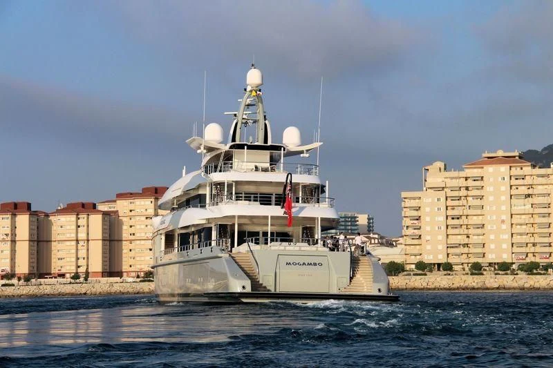 a large white boat in the water aboard MOGAMBO Yacht for Sale