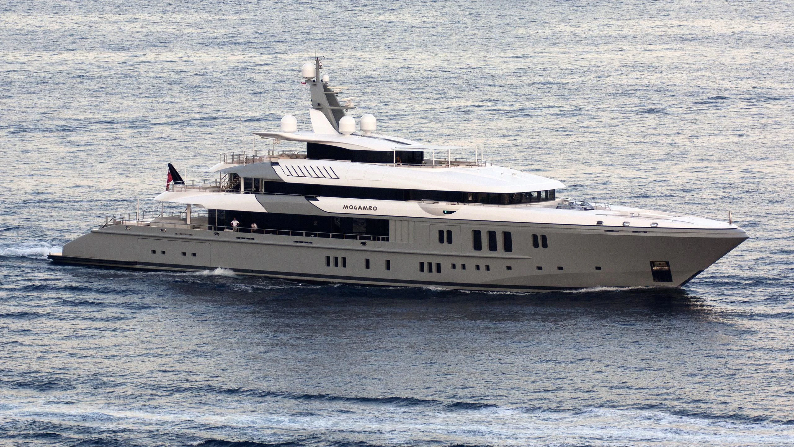 a large white ship in the water aboard MOGAMBO Yacht for Sale