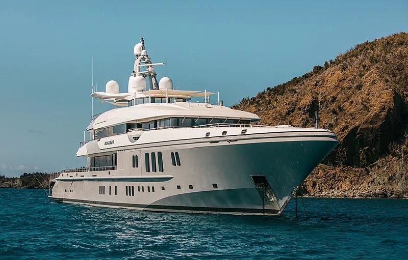 a white boat in the water aboard MOGAMBO Yacht for Sale