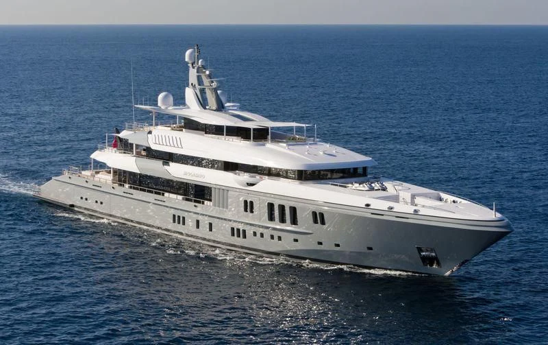 a large white ship in the water aboard MOGAMBO Yacht for Sale
