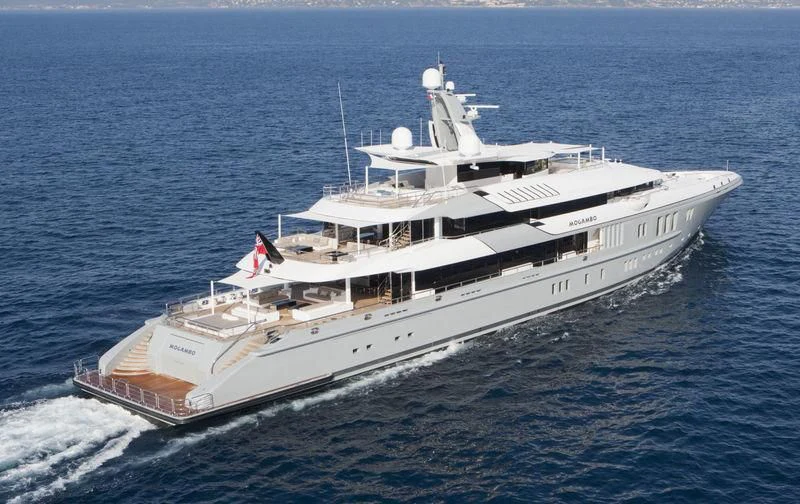 a large white ship in the water aboard MOGAMBO Yacht for Sale