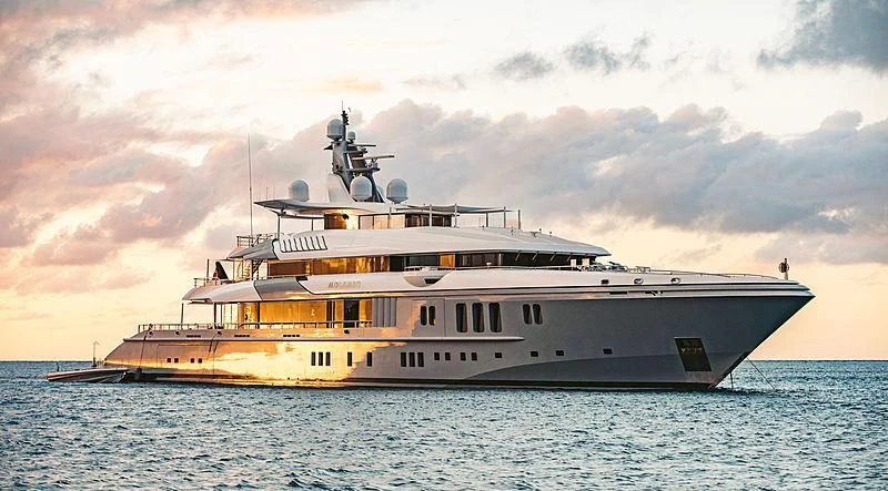 a large ship in the water aboard MOGAMBO Yacht for Sale