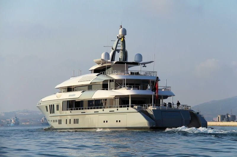 a large white boat on the water aboard MOGAMBO Yacht for Sale