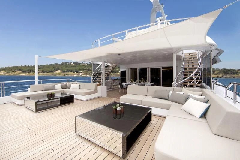 a large white house with a balcony aboard MOGAMBO Yacht for Sale