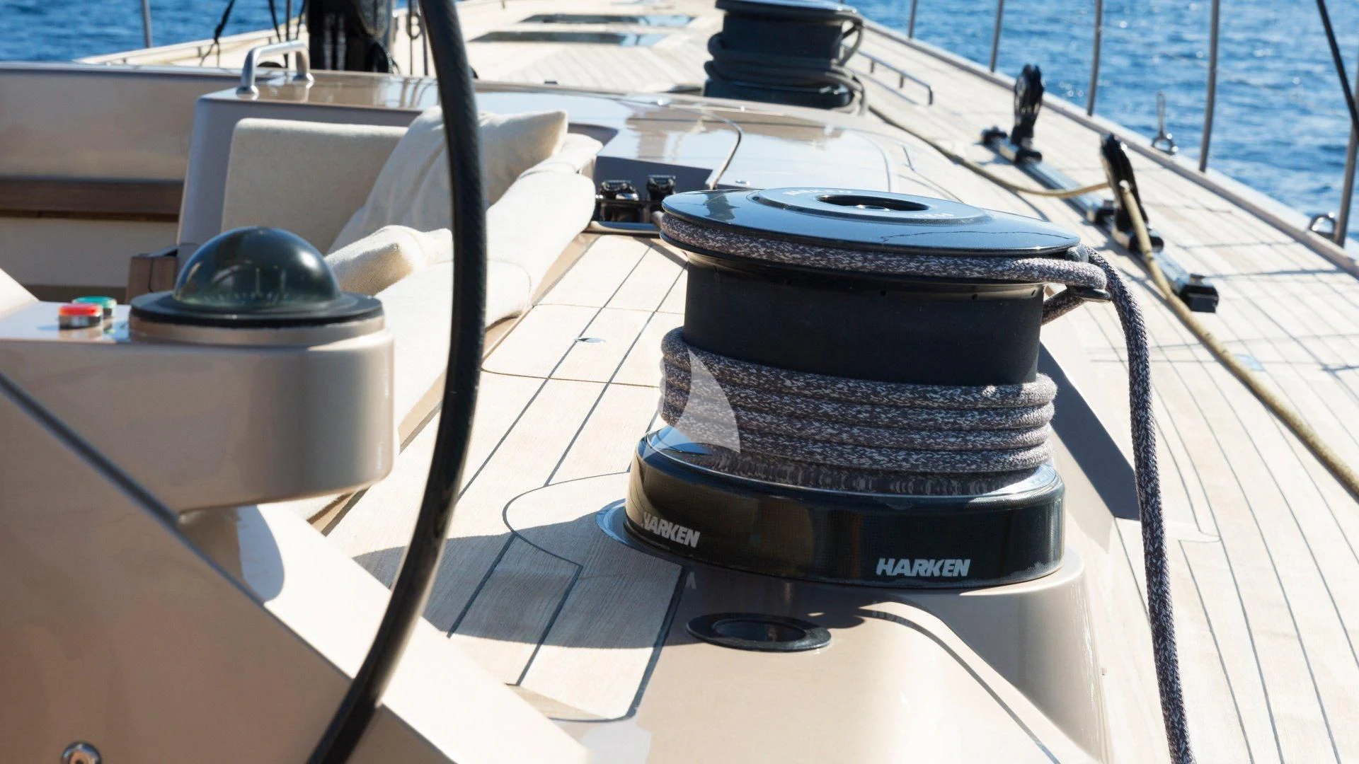 a black record player on a boat aboard WALLY LOVE Yacht for Charter
