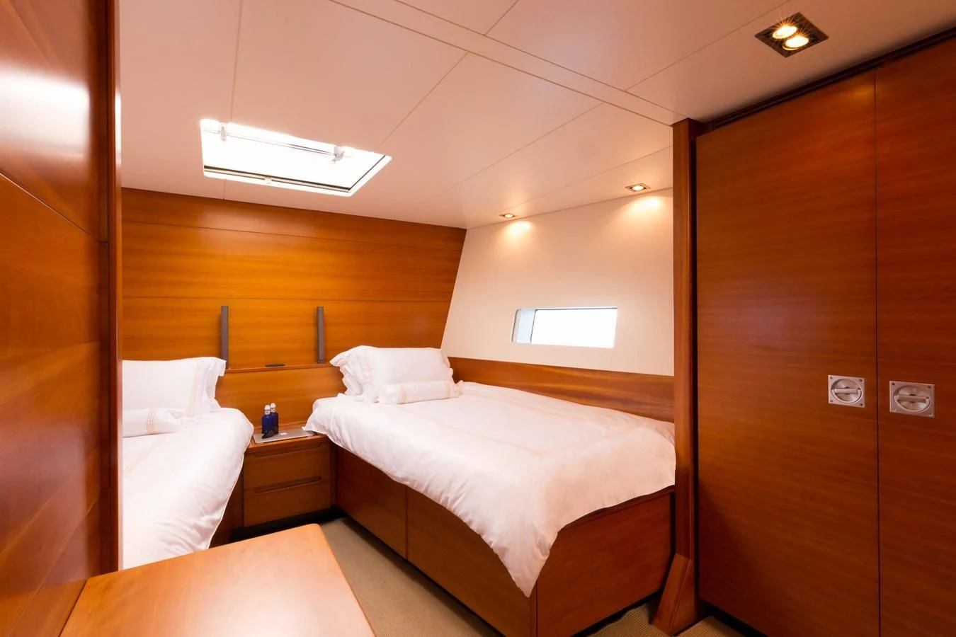 a room with two beds aboard WALLY LOVE Yacht for Charter
