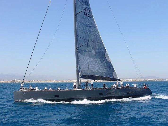 a sailboat with people on it aboard WALLY LOVE Yacht for Charter