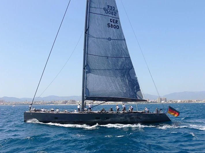 a sailboat with people on it aboard WALLY LOVE Yacht for Charter