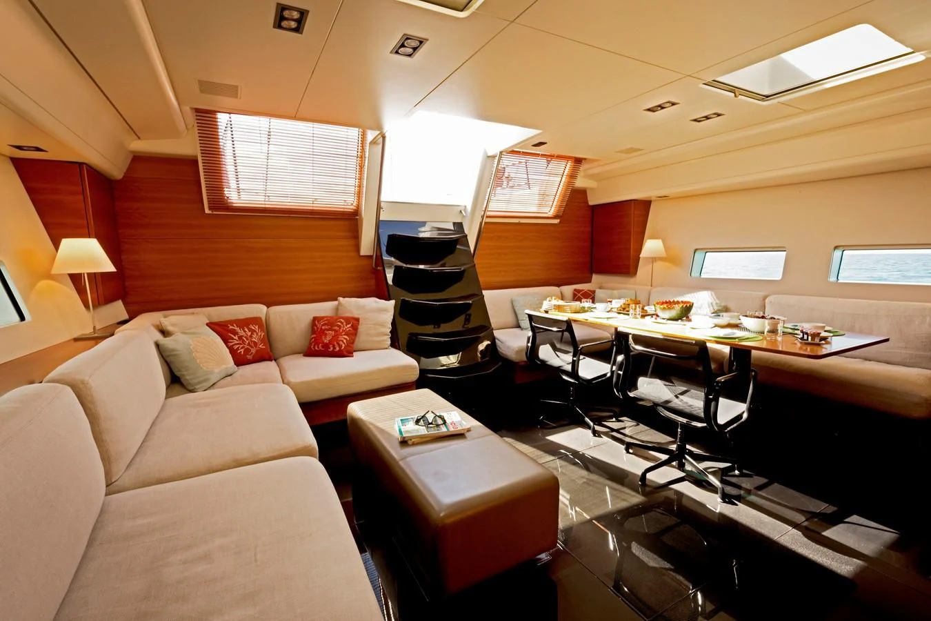 a living room with a couch and a tv aboard WALLY LOVE Yacht for Charter