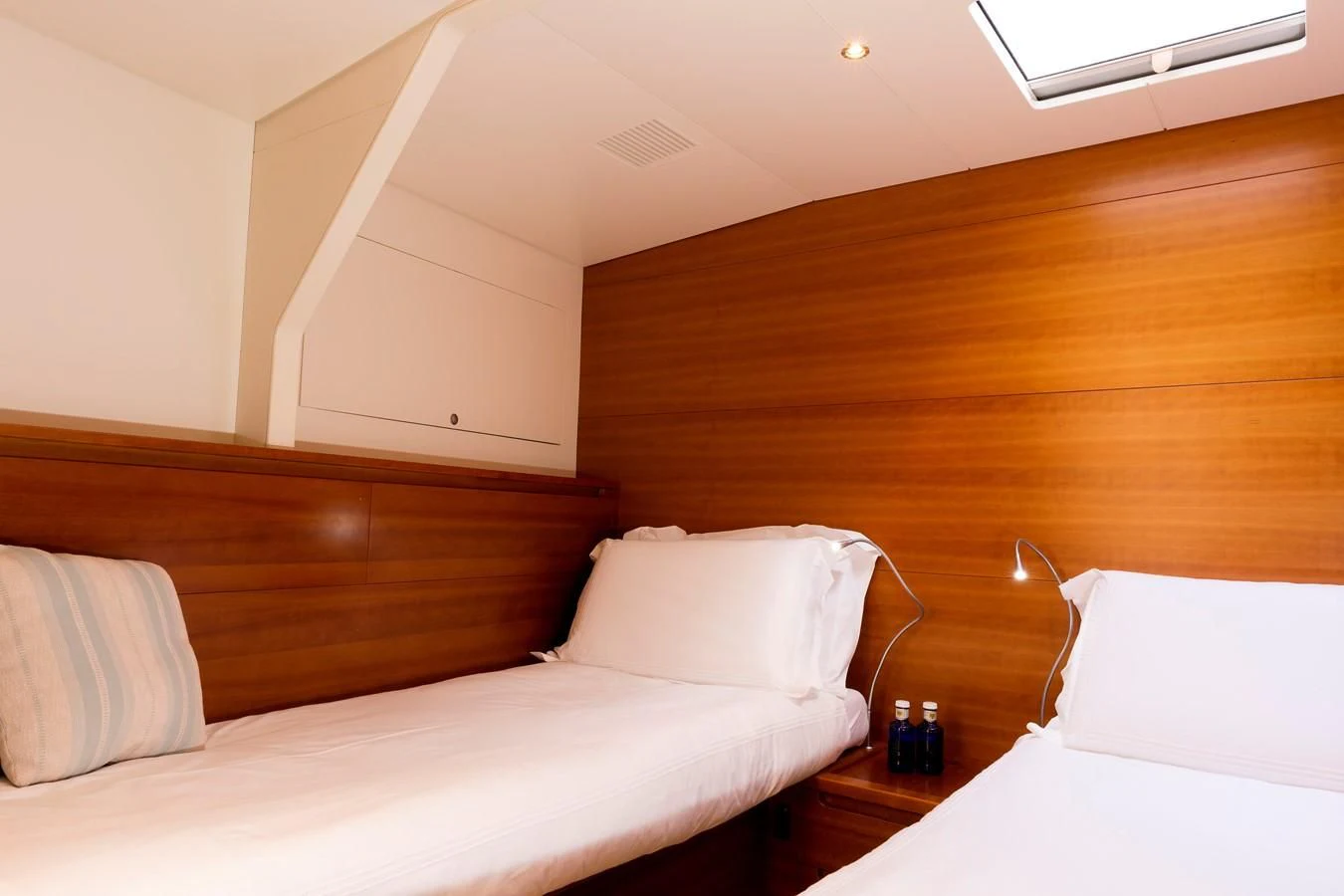 a room with two beds aboard WALLY LOVE Yacht for Charter