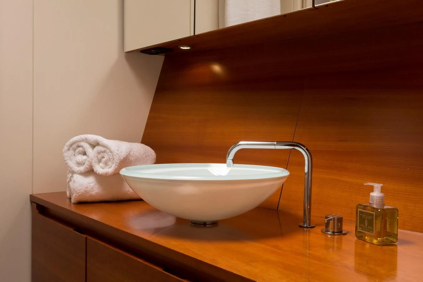 a sink with a towel on it aboard WALLY LOVE Yacht for Charter