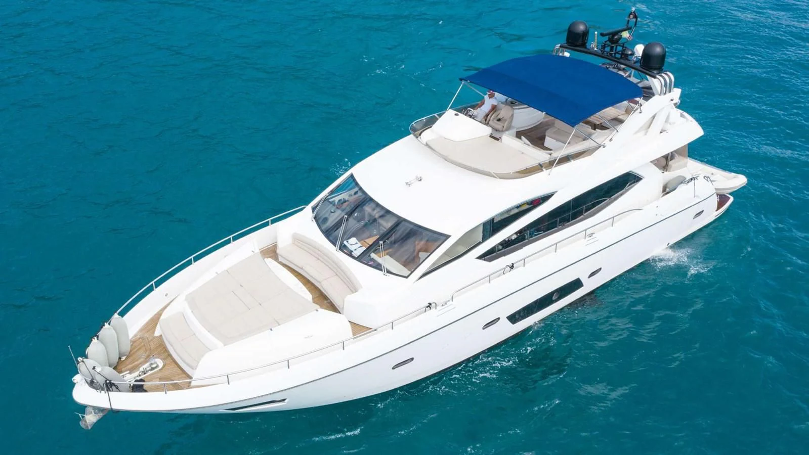a white boat in the water aboard SUNSEEKER 70' MANHATTAN Yacht for Sale