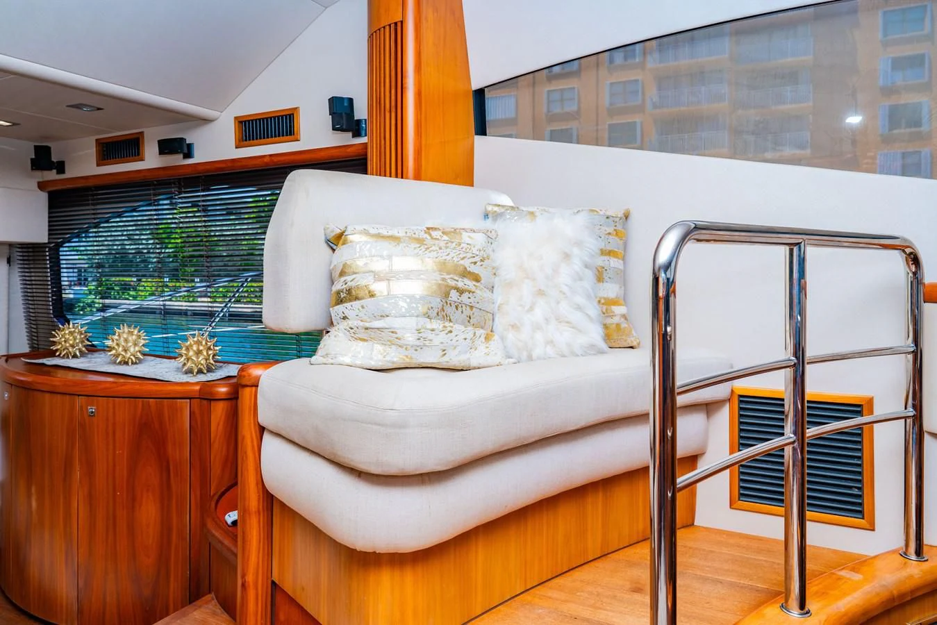 a white couch with a white pillow aboard SUNSEEKER 70' MANHATTAN Yacht for Sale