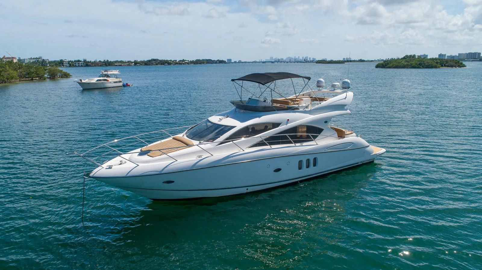 a boat in the water aboard SUNSEEKER 70' MANHATTAN Yacht for Sale