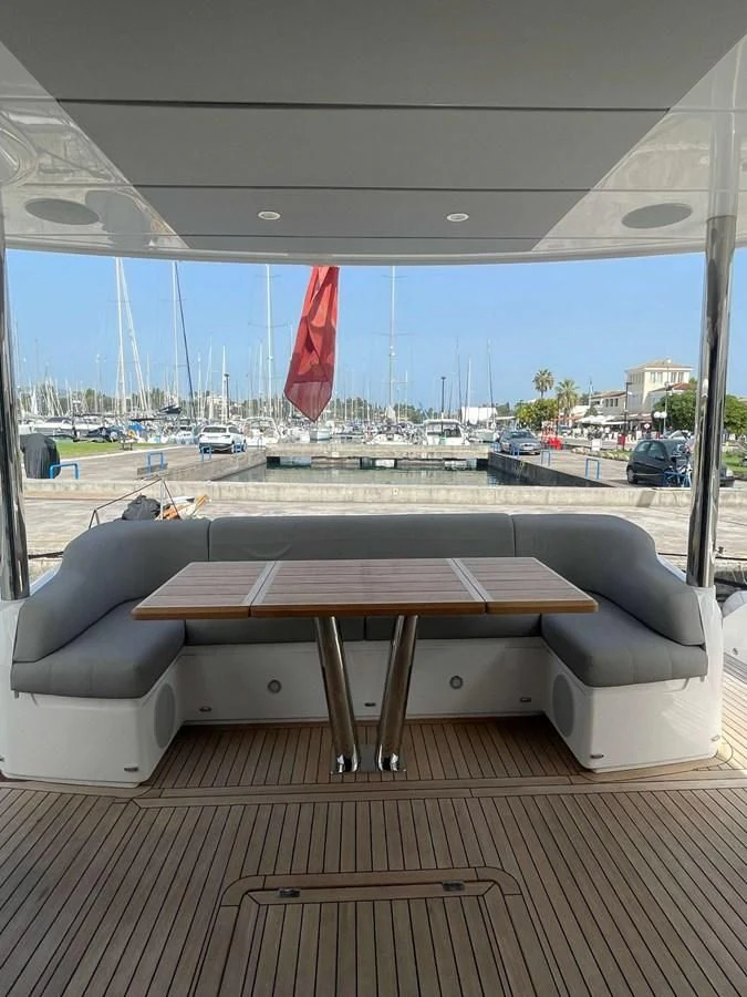 a table on a deck aboard SUNSEEKER 70' MANHATTAN Yacht for Sale
