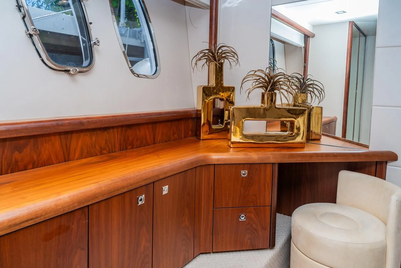 a bathroom with a vanity and mirror aboard SUNSEEKER 70' MANHATTAN Yacht for Sale