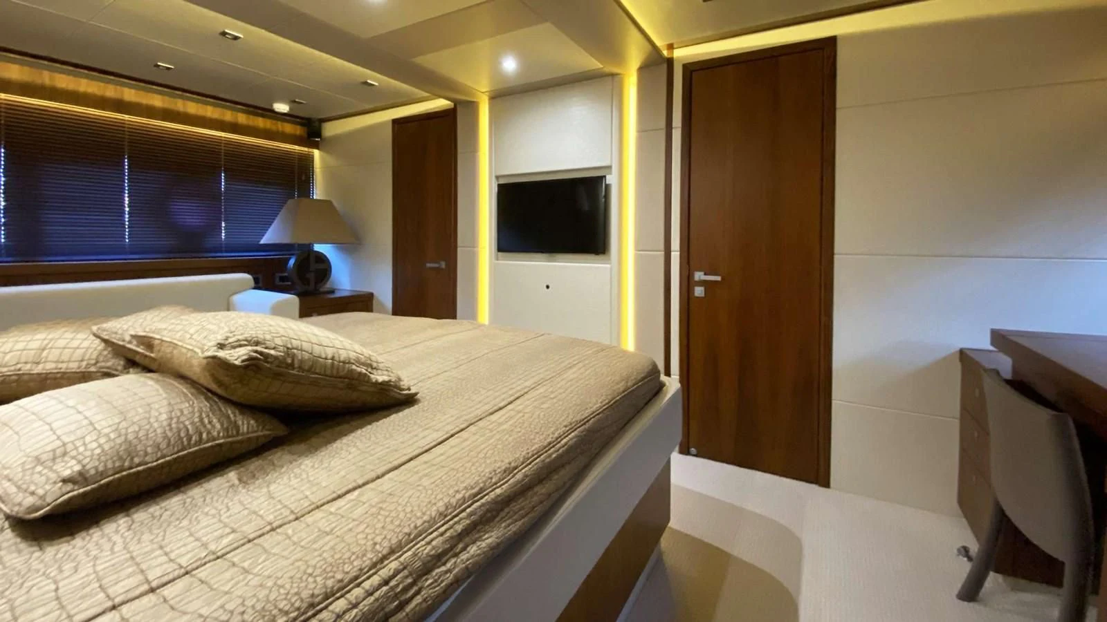 a bed in a room aboard SUNSEEKER 70' MANHATTAN Yacht for Sale