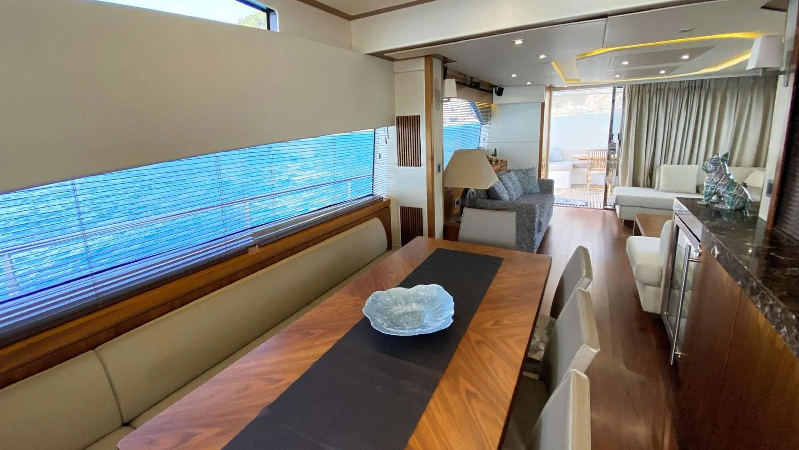 a large room with a pool table aboard SUNSEEKER 70' MANHATTAN Yacht for Sale