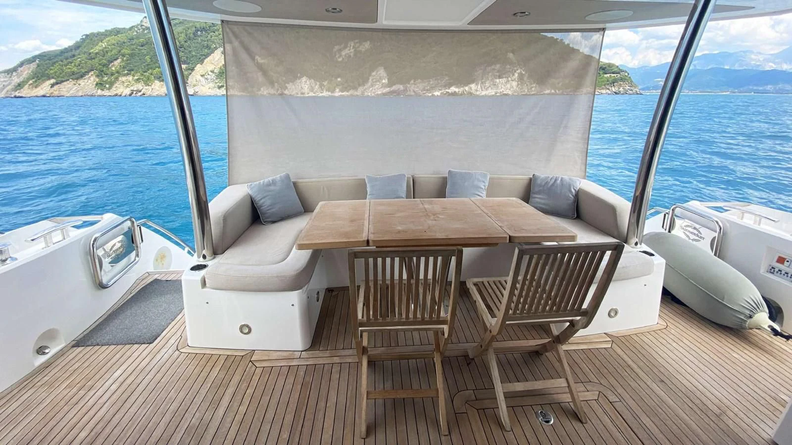 a boat on the water aboard SUNSEEKER 70' MANHATTAN Yacht for Sale