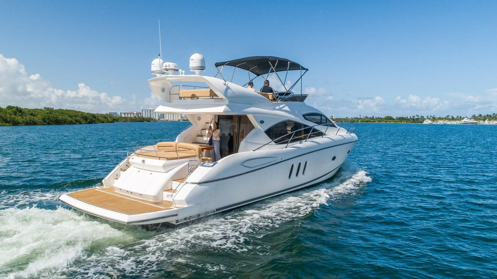 a boat on the water aboard SUNSEEKER 70' MANHATTAN Yacht for Sale