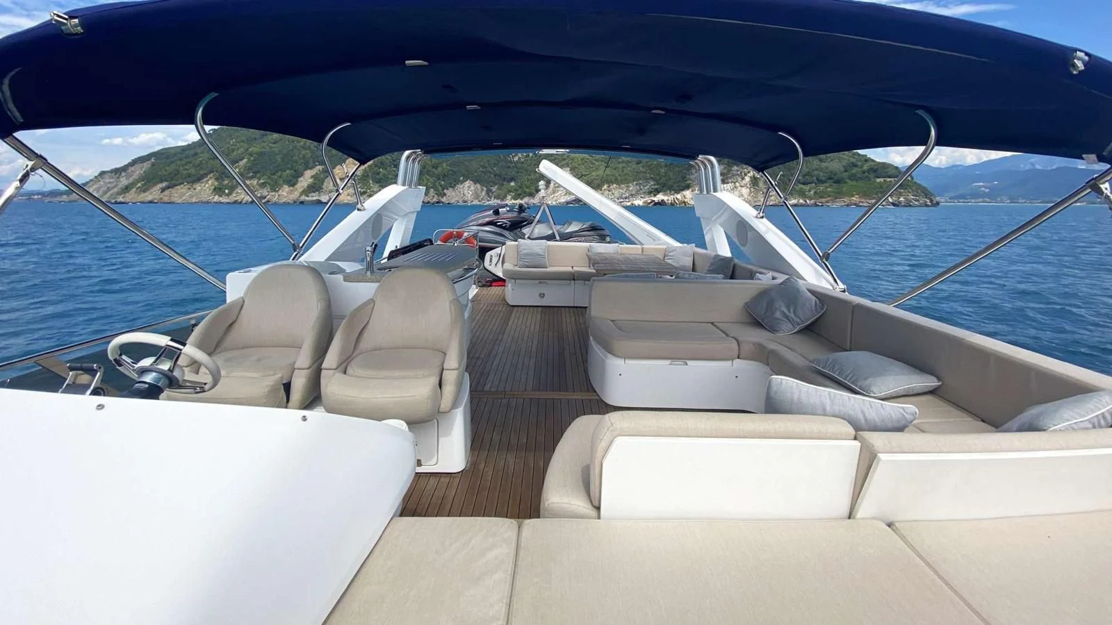 a boat on the water aboard SUNSEEKER 70' MANHATTAN Yacht for Sale